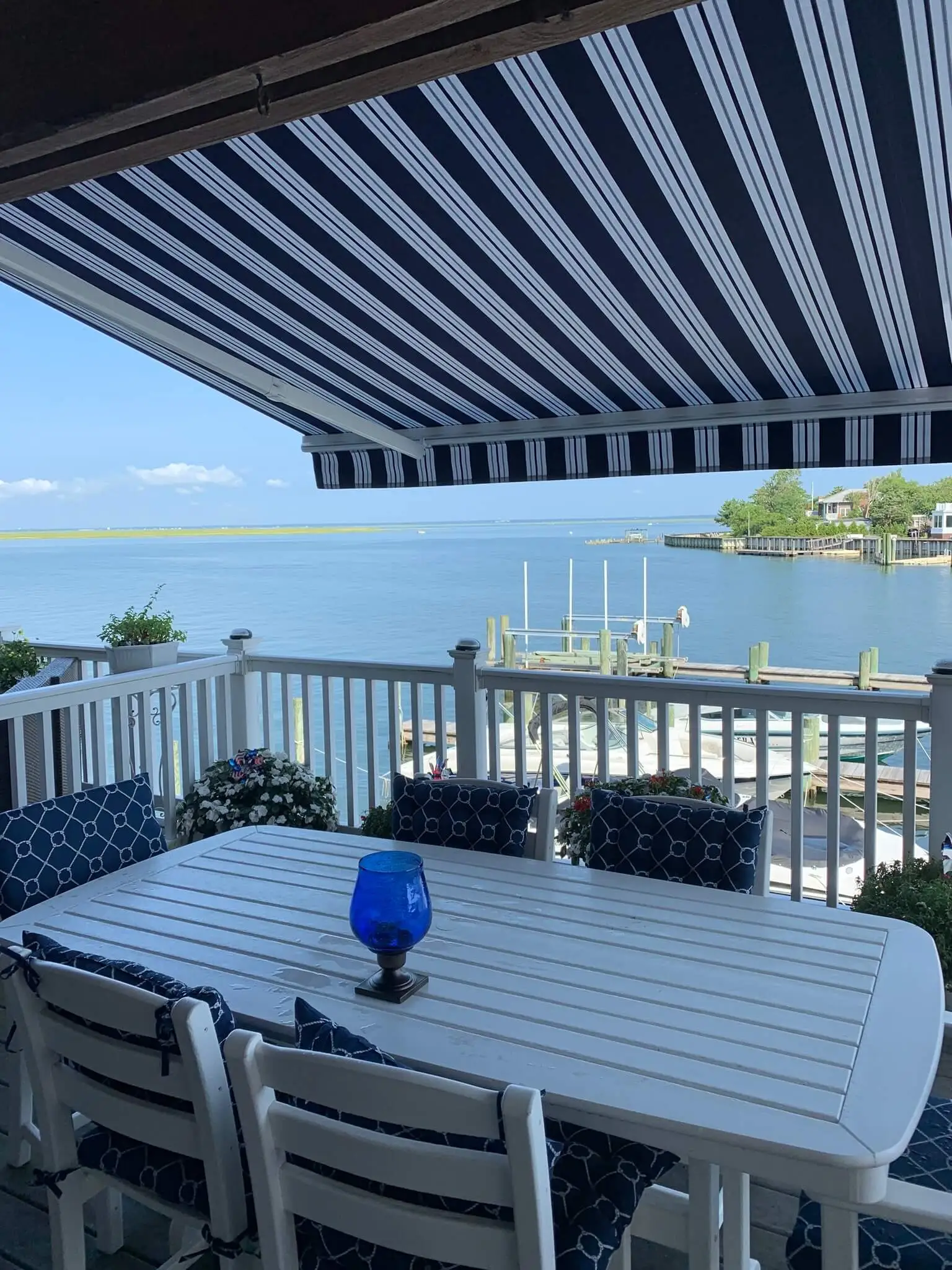 Eclipse Premier™ retractable awning mounted above a residential patio