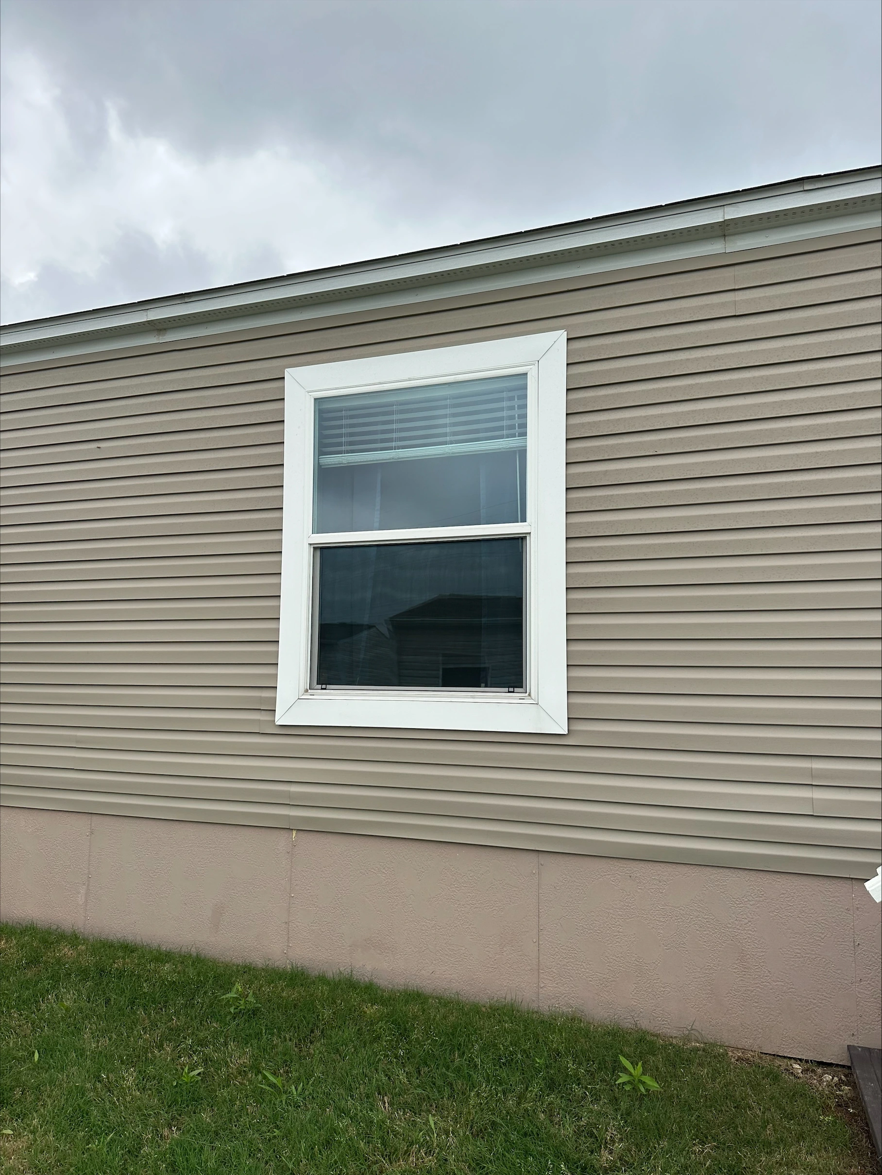 Energy-efficient Low-E argon-filled replacement glass installed in a residential window