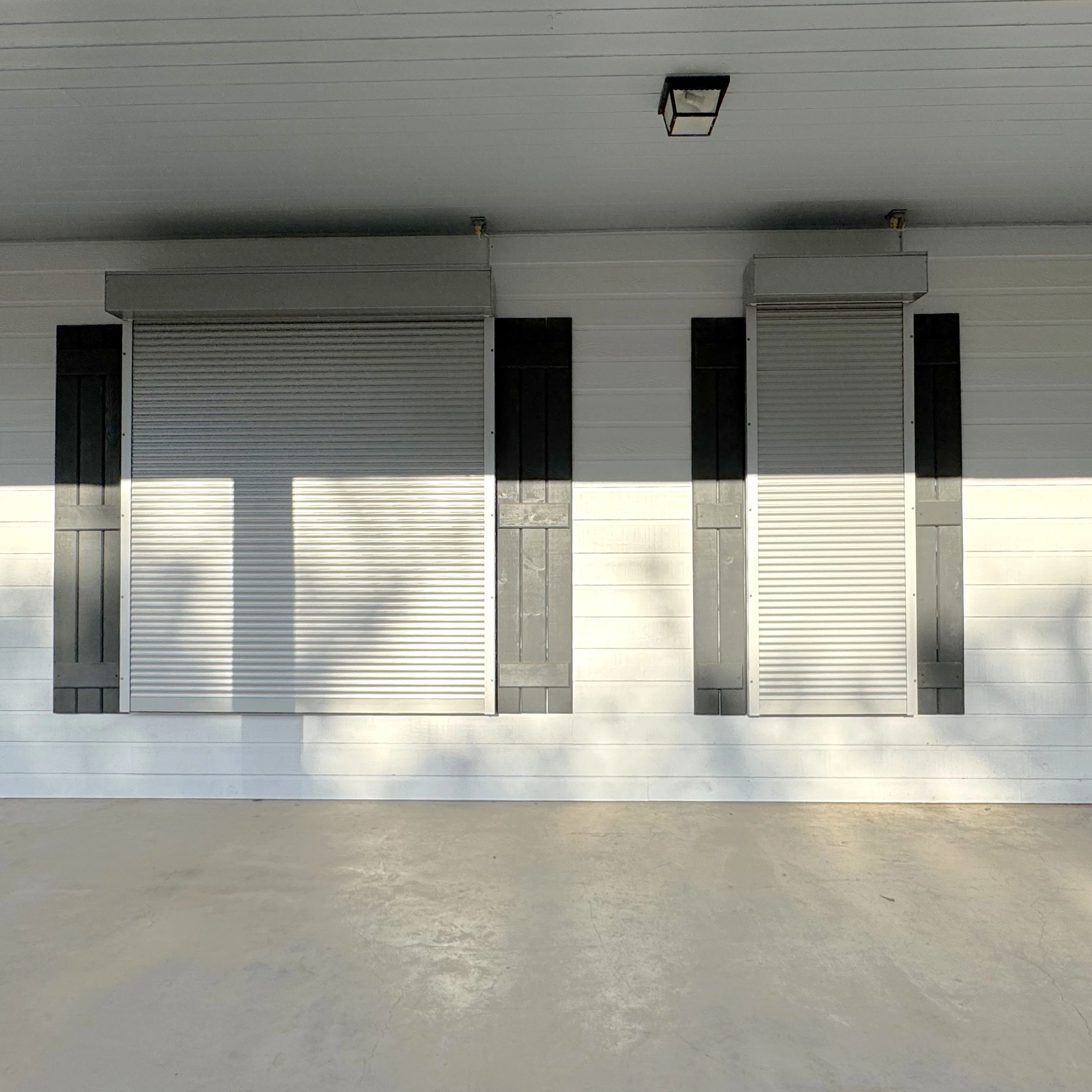 Shades of Texas security shutters - residential storm shutter installation in Bellaire