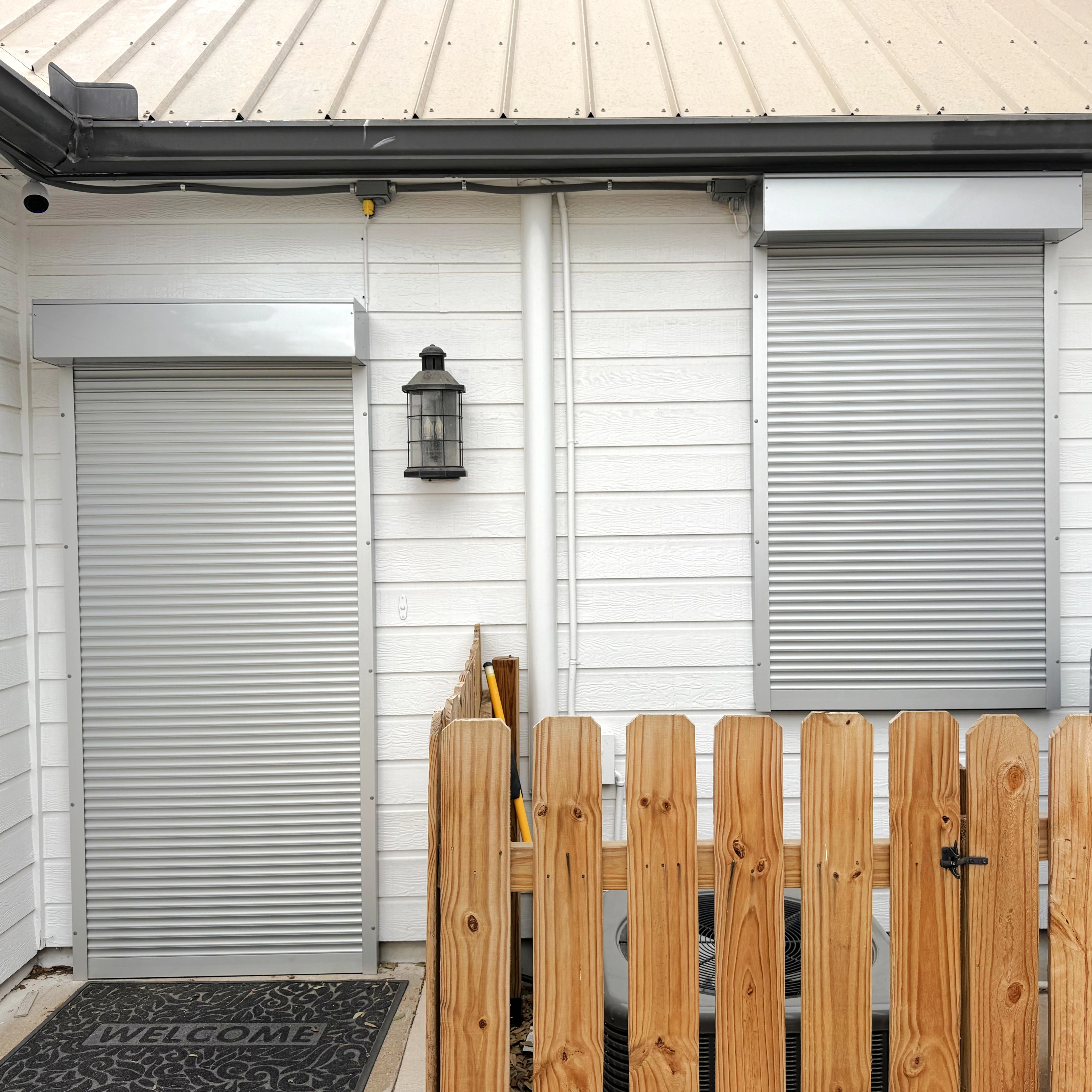 Shades of Texas security shutters - residential storm shutter installation in Bellaire
